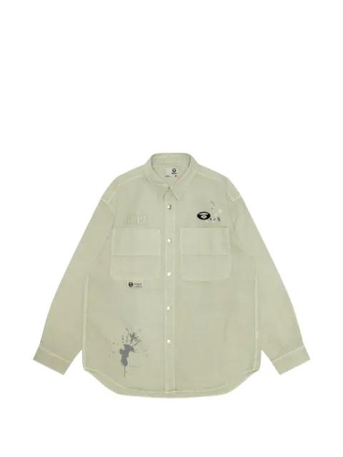 Moonface splatter embroidered shirt by BAPE