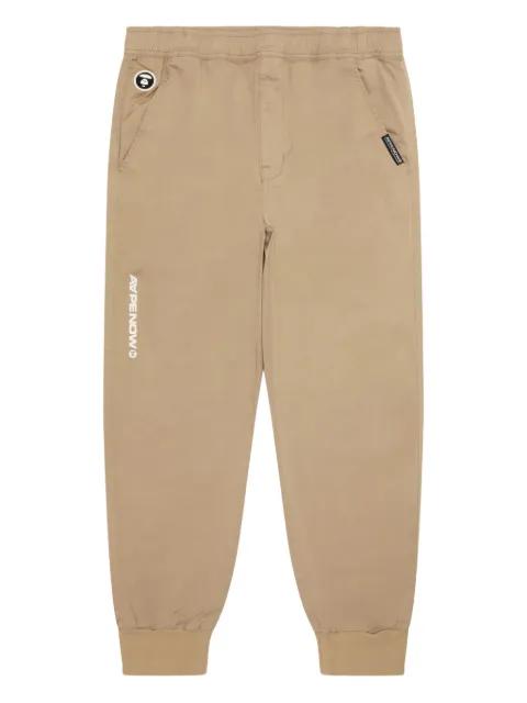 ape head logo-plaque regular trousers by BAPE