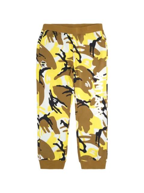 camo patterned track pants by BAPE