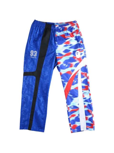 camo-print panelled track pants by BAPE