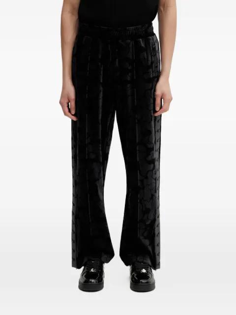 camouflage-pattern trousers by BAPE