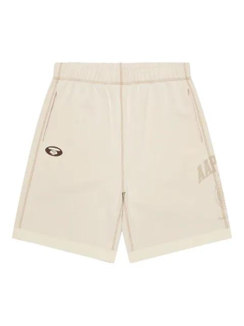 graphic-print track shorts by BAPE