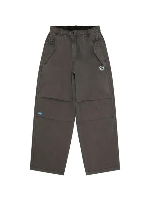 logo-appliqué trousers by BAPE