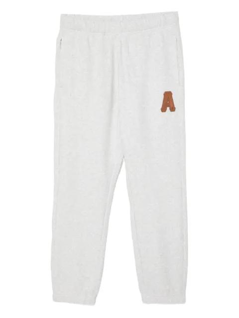 logo-embossed trousers by BAPE