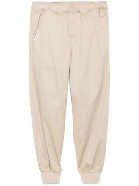 logo-patch tapered trousers by BAPE