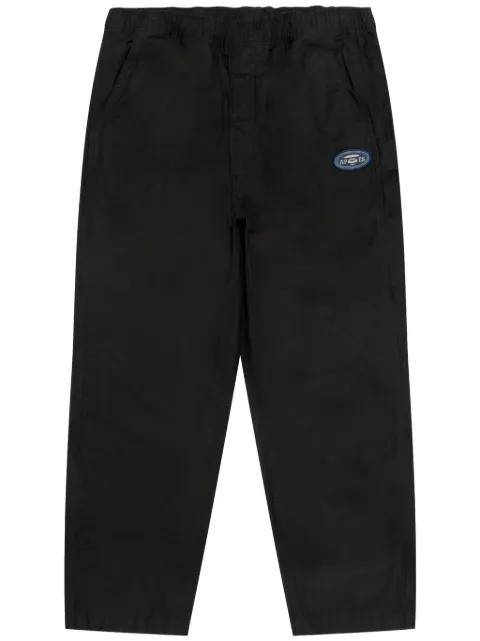 logo-patch trousers by BAPE