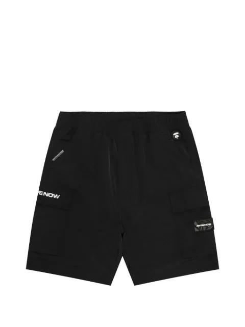 moonface logo cargo shorts by BAPE