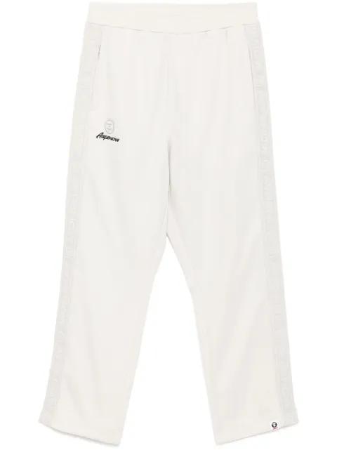 moonface-logo track pants by BAPE
