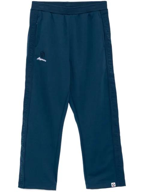 moonface-logo track pants by BAPE