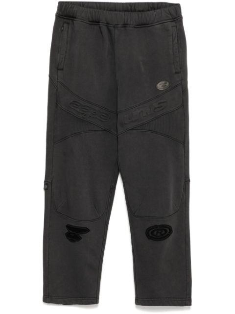 moonface-logo track pants by BAPE