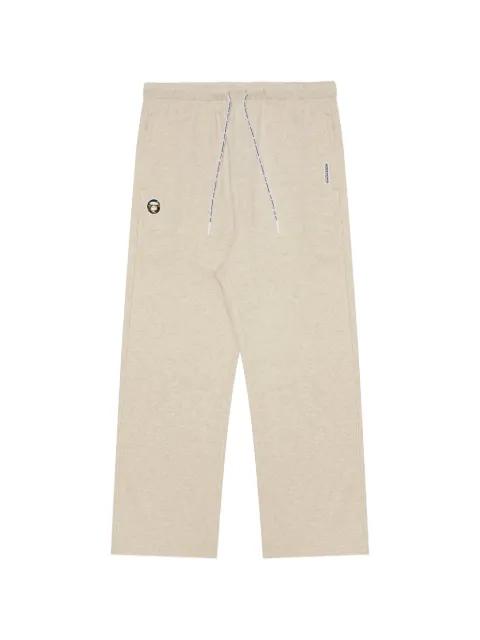 moonface patch straight-leg track pants by BAPE