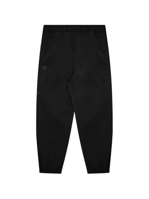 moonface patch track pants by BAPE