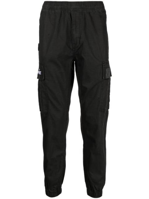 tapered-leg cargo trousers by BAPE