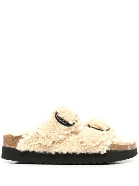 Arizona Big Buckle shearling slides by BIRKENSTOCK