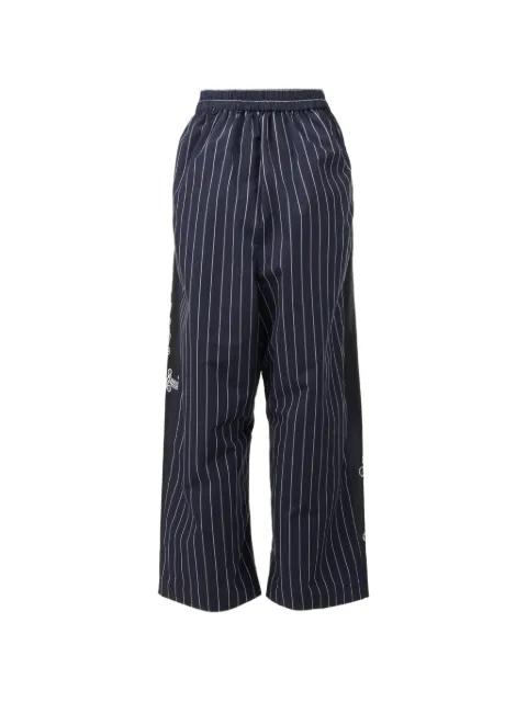 striped-pattern trousers by BIYAN