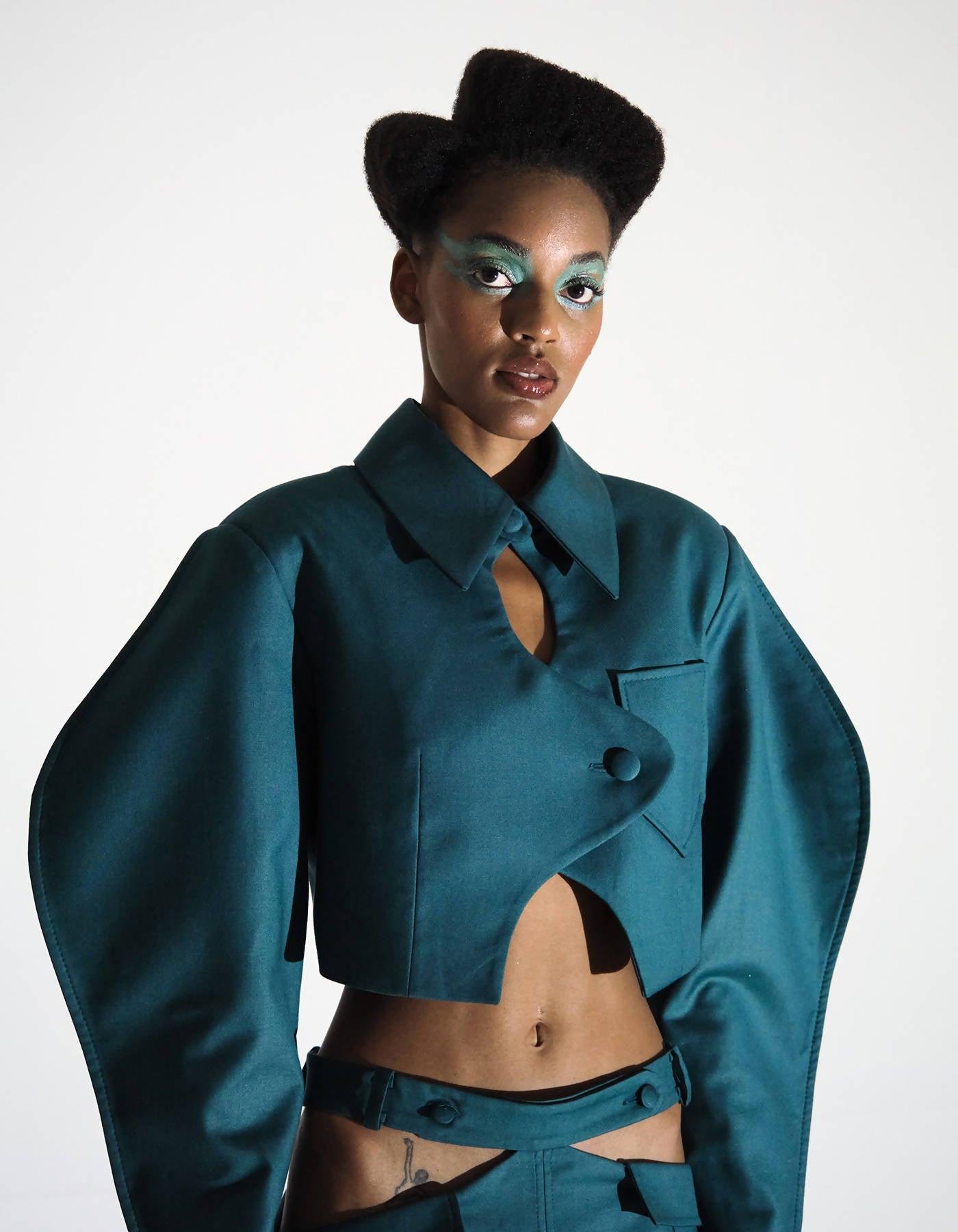 SS22. Collared Puff-Sleeve Cropped Suit Jacket by BLIKVANGER