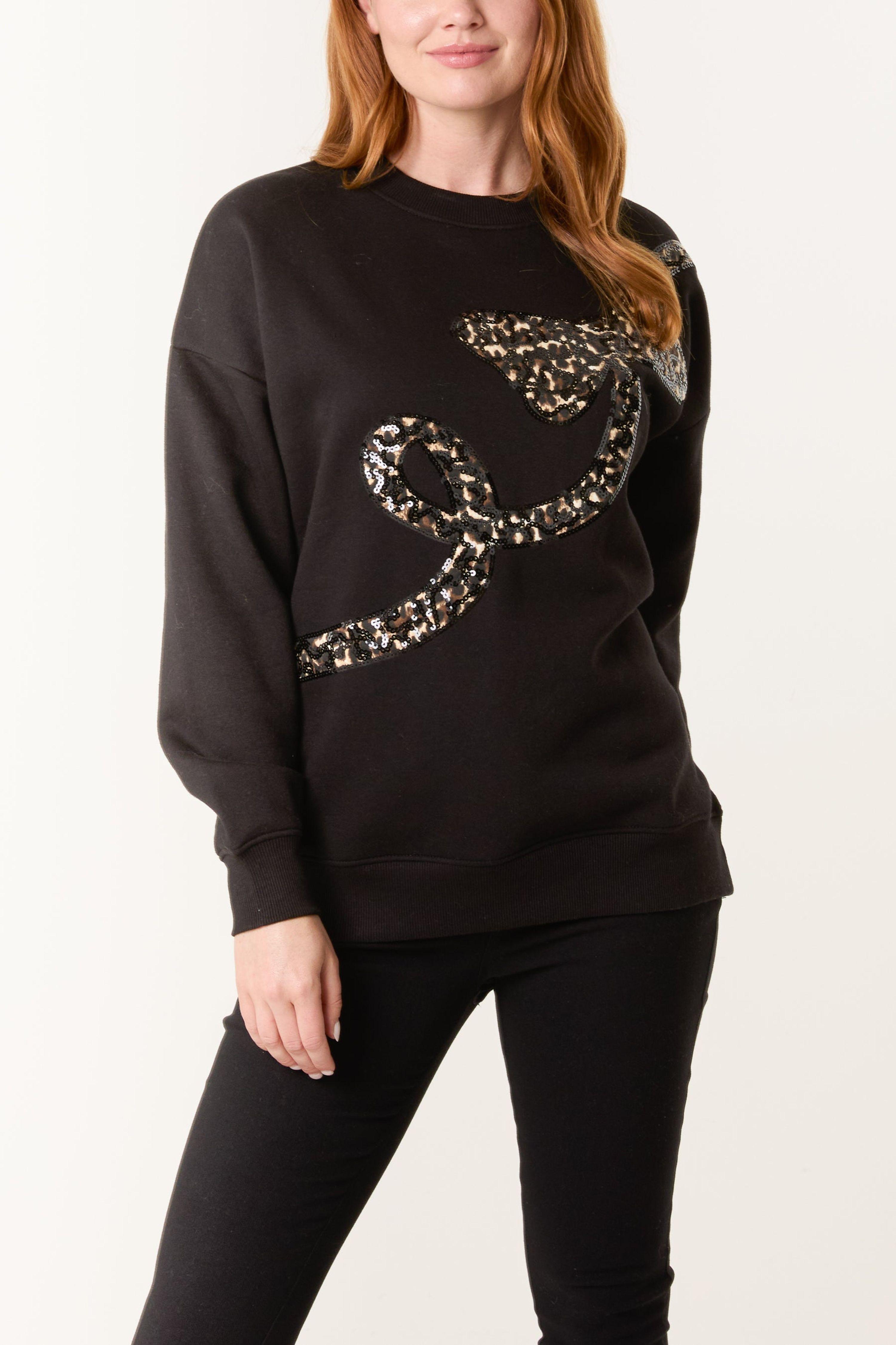 Black Leopard And Sequin Bow Sweatshirt by BLUE VANILLA