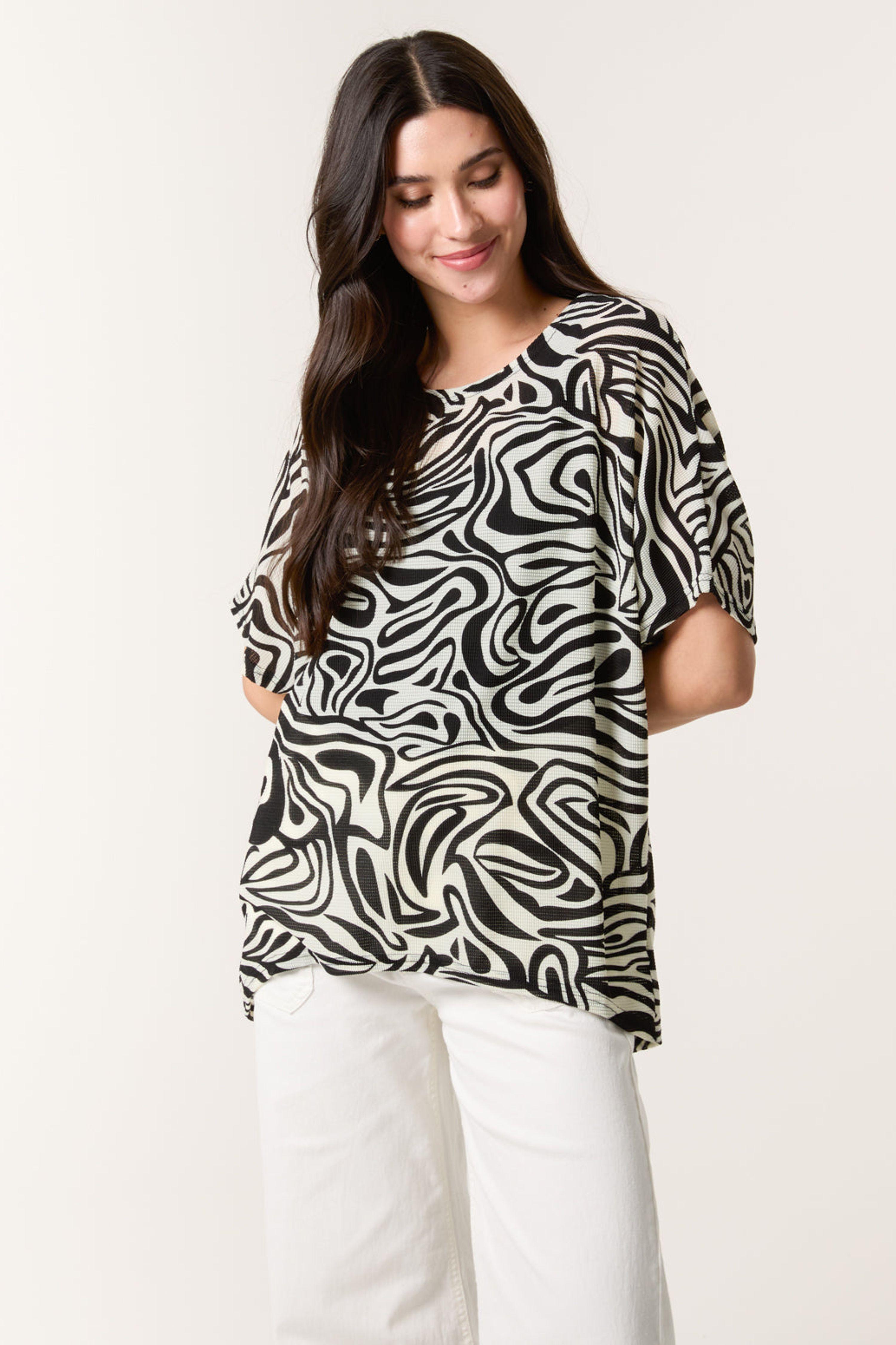 Black Short-Sleeved Top With Abstract Print by BLUE VANILLA