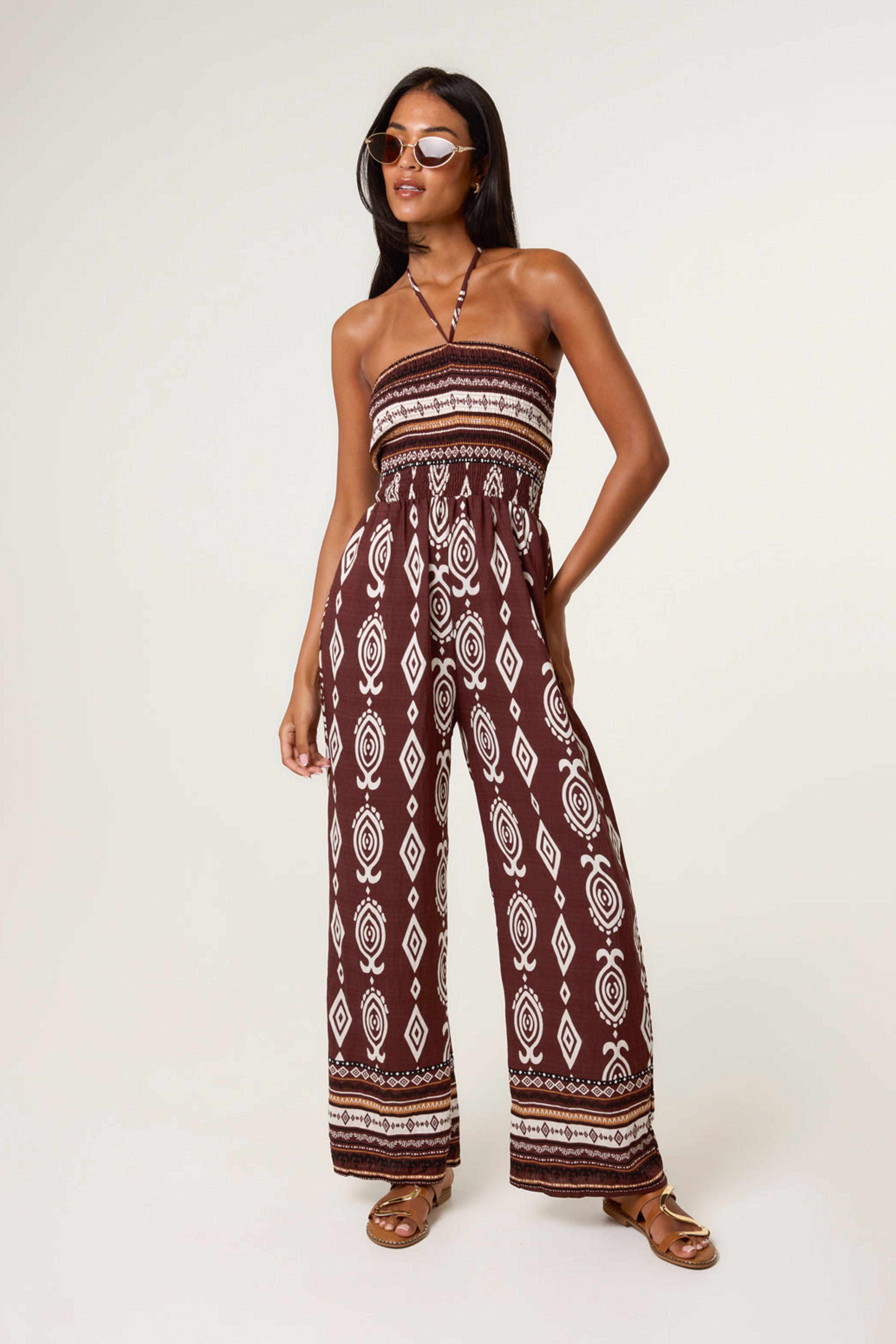 Brown Ethnic Print Strapless Elasticated Jumpsuit by BLUE VANILLA