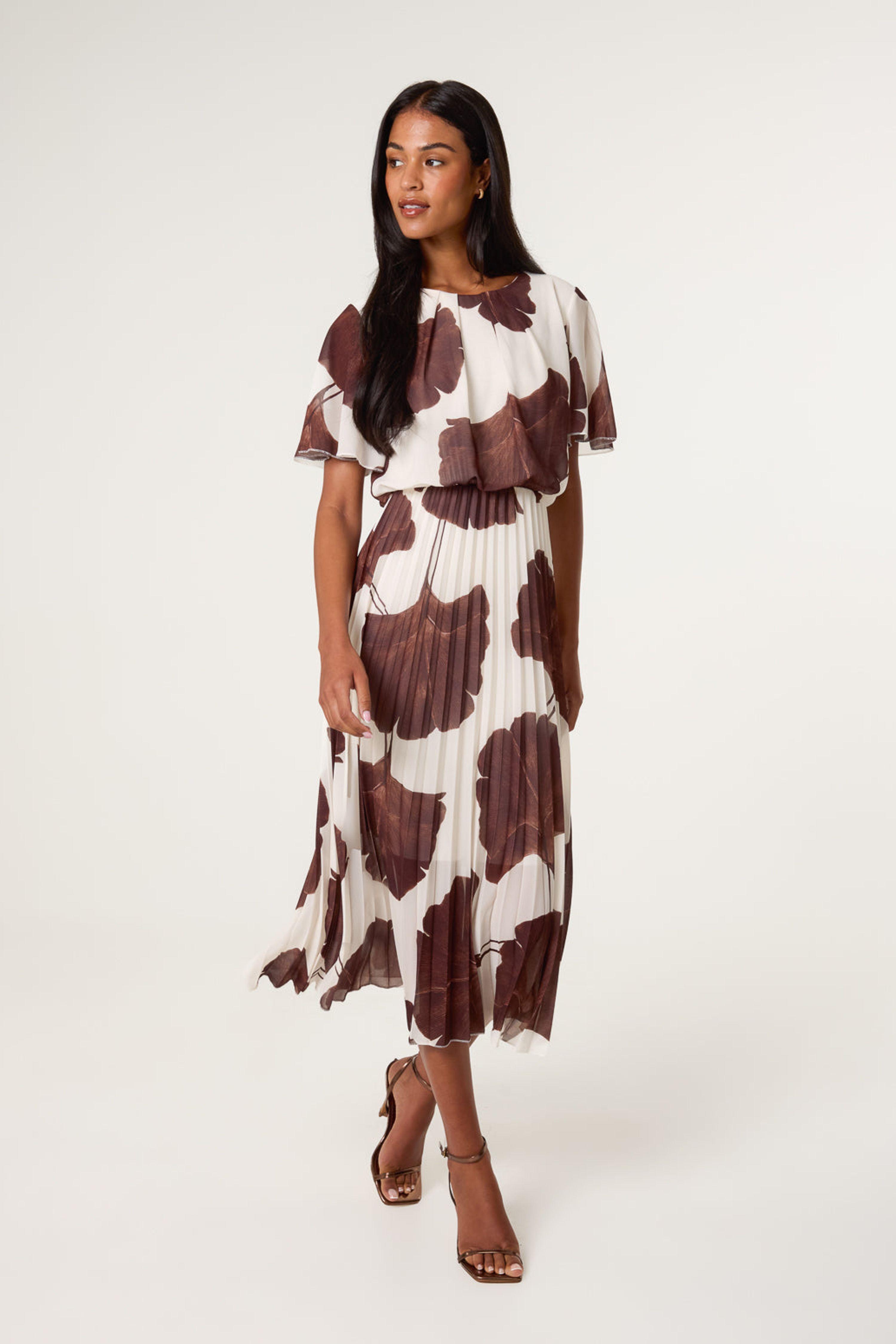 Brown Large Floral Print Scoop Neck Pleated Dress by BLUE VANILLA