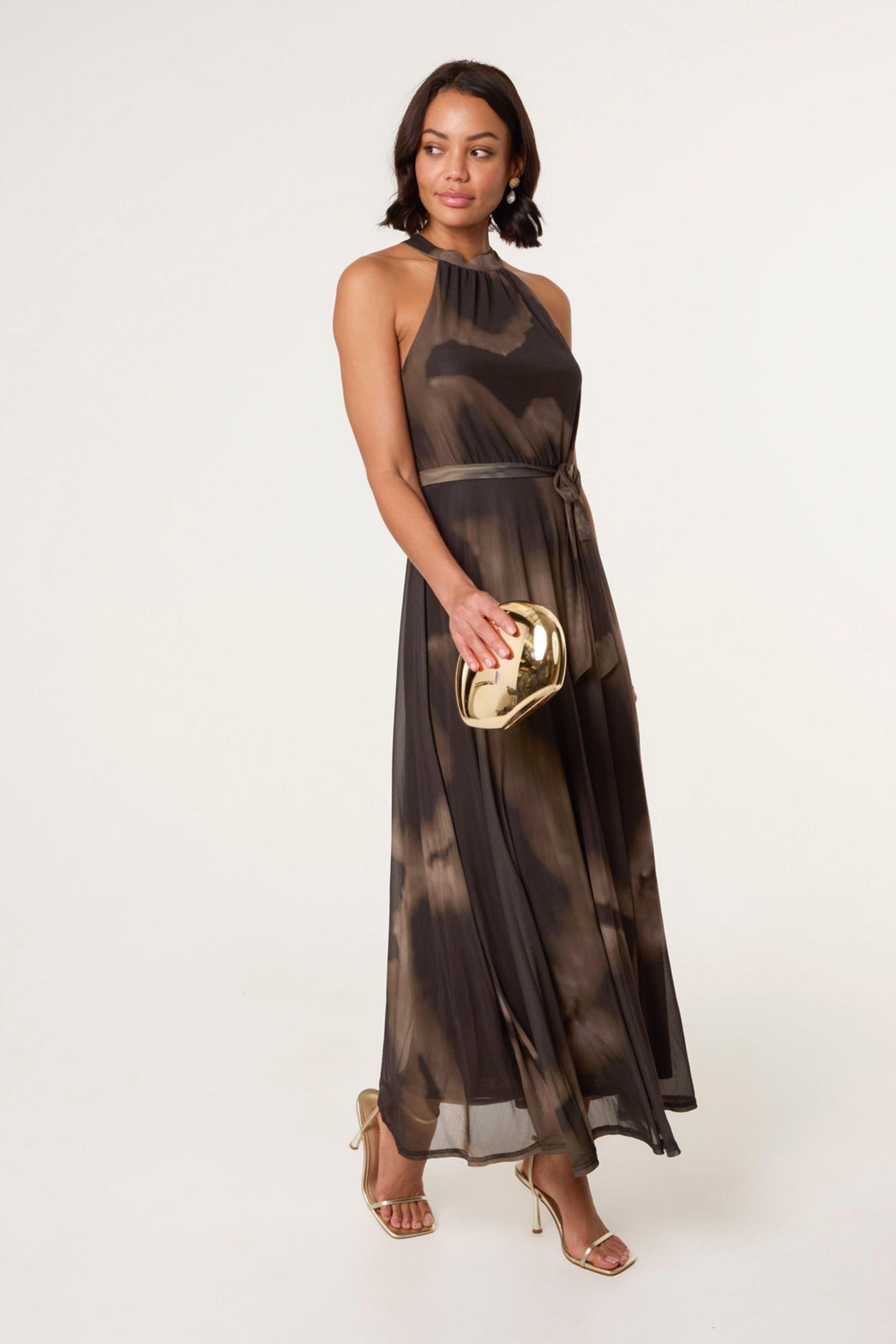 Brown Printed Mesh Halterneck Belted Maxi Dress by BLUE VANILLA
