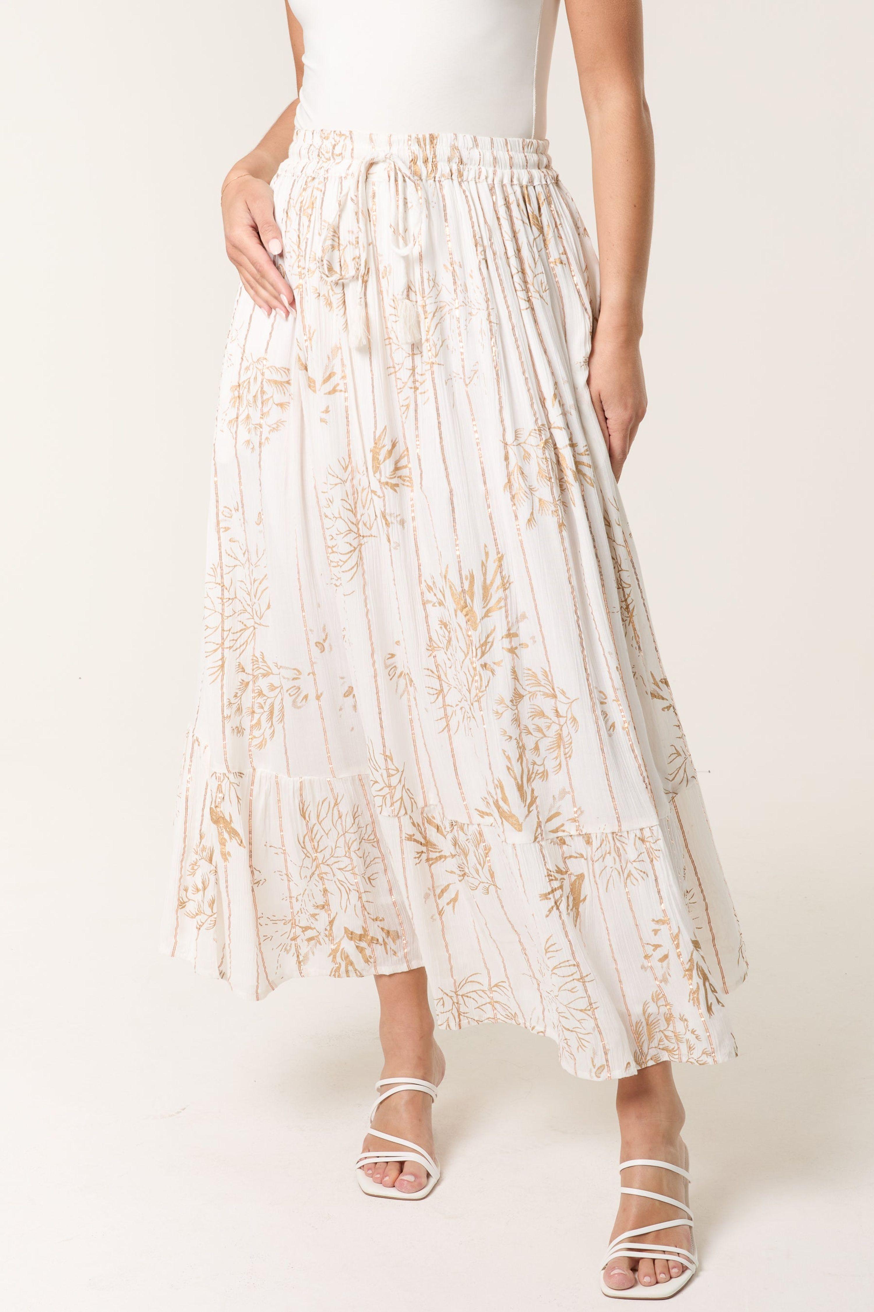 Ivory Gold Foil Print Peplum Hem Skirt by BLUE VANILLA
