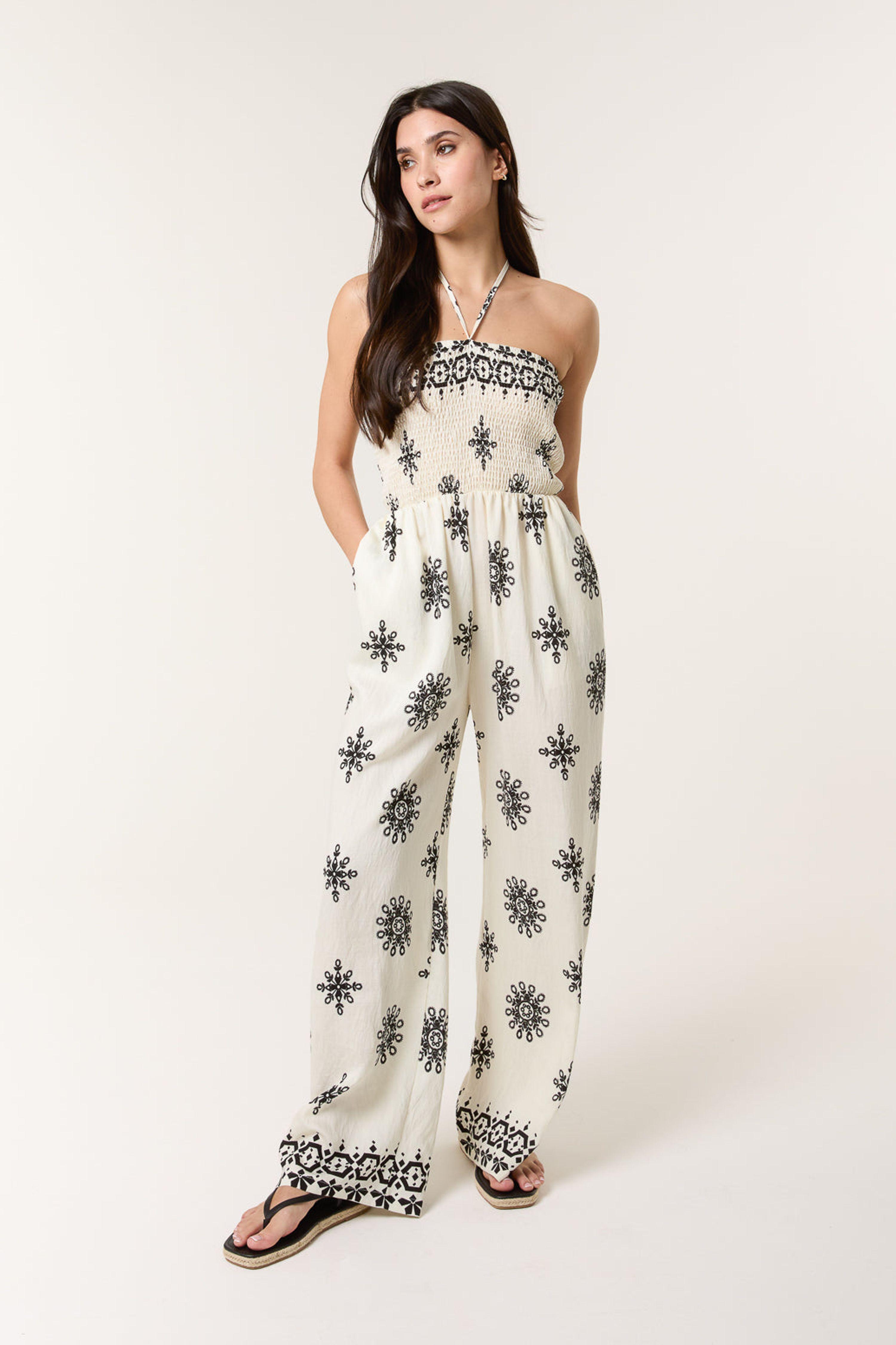 Ivory Jumpsuit With Floral Print by BLUE VANILLA Ivory Jumpsuit With Floral Print by BLUE VANILLA