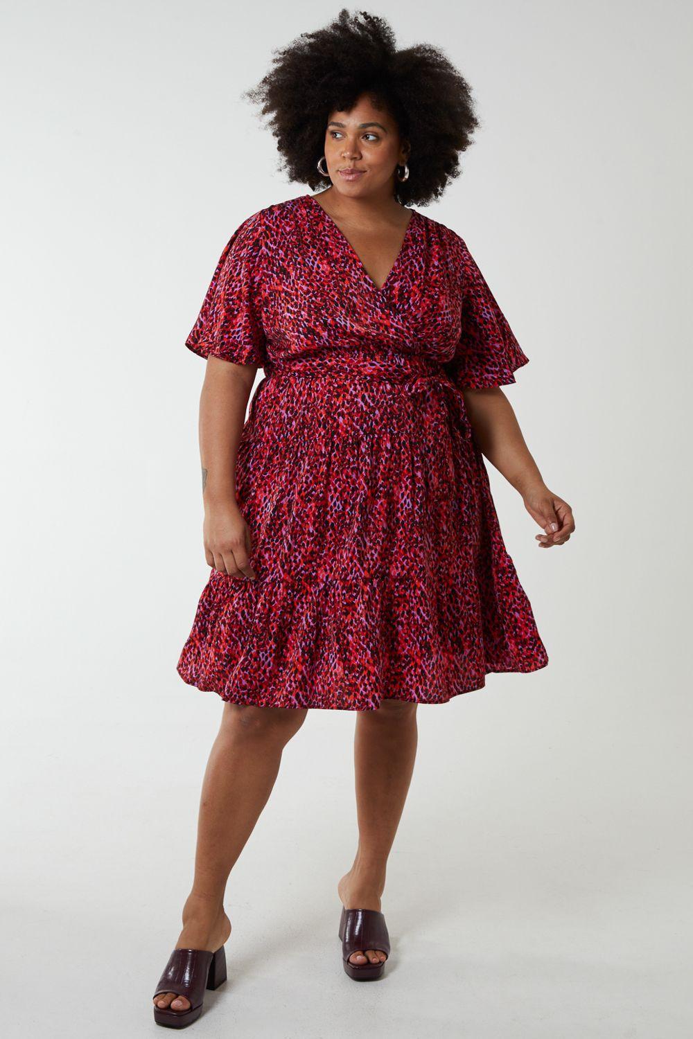 Plus Size Wrap Front Tier Hem Angel Sleeve Dress by BLUE VANILLA