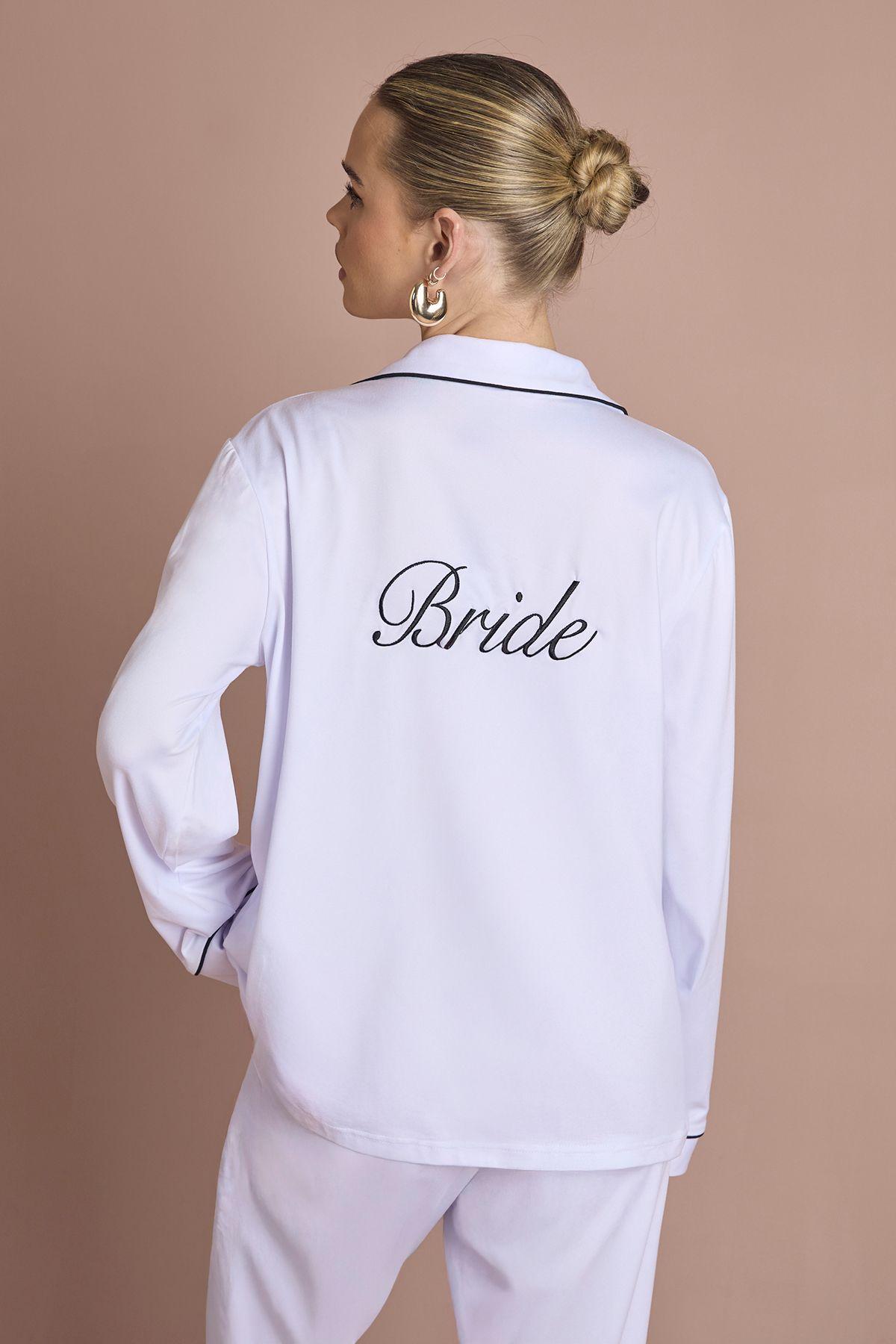 Bridal 'Bride' Jersey Embroidered Long Sleeve Shirt & Trousers Pyjama Set by BOOHOO Bridal 'Bride' Jersey Embroidered Long Sleeve Shirt & Trousers Pyjama Set by BOOHOO