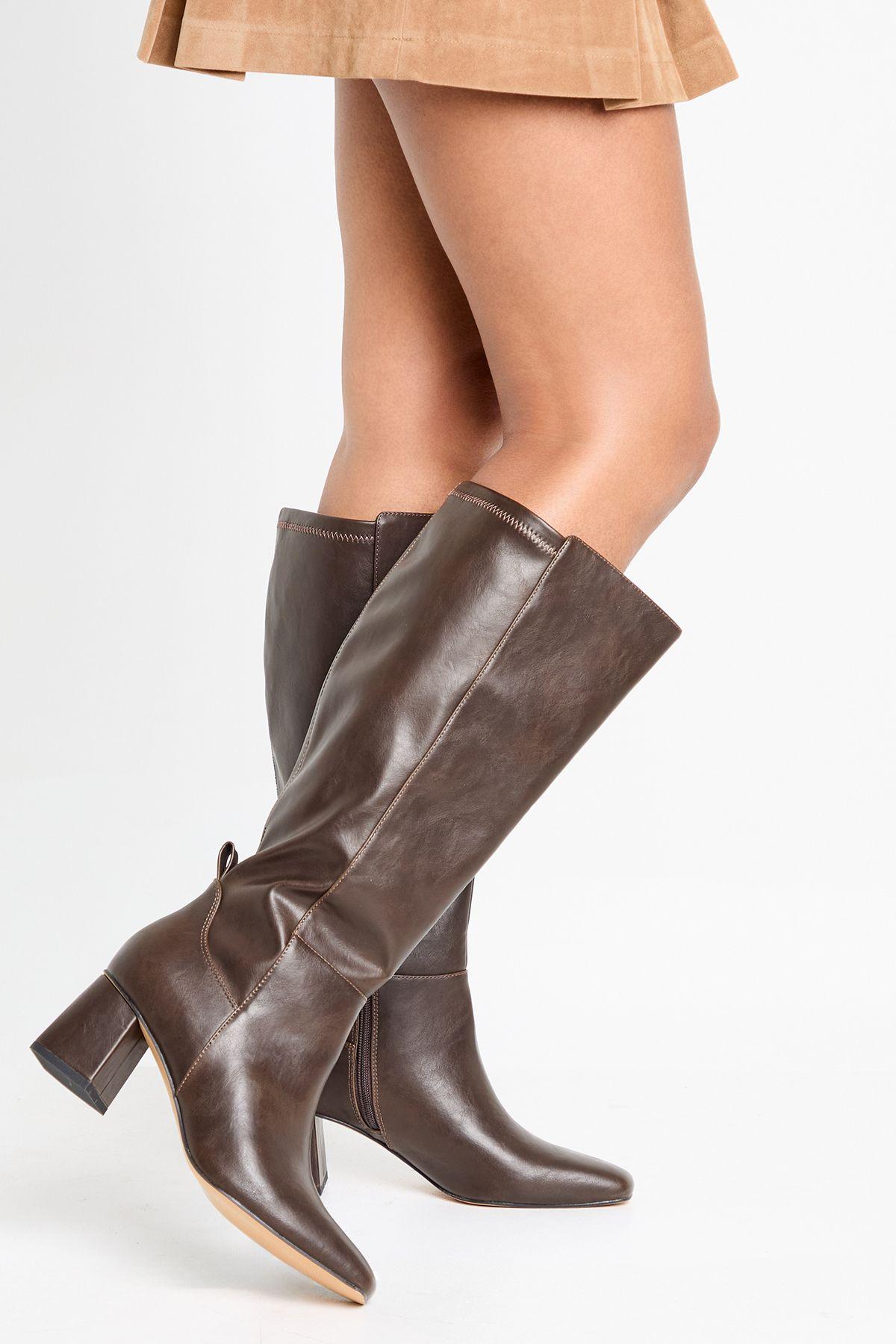Flared Heel Stretch Knee High Boots by BOOHOO