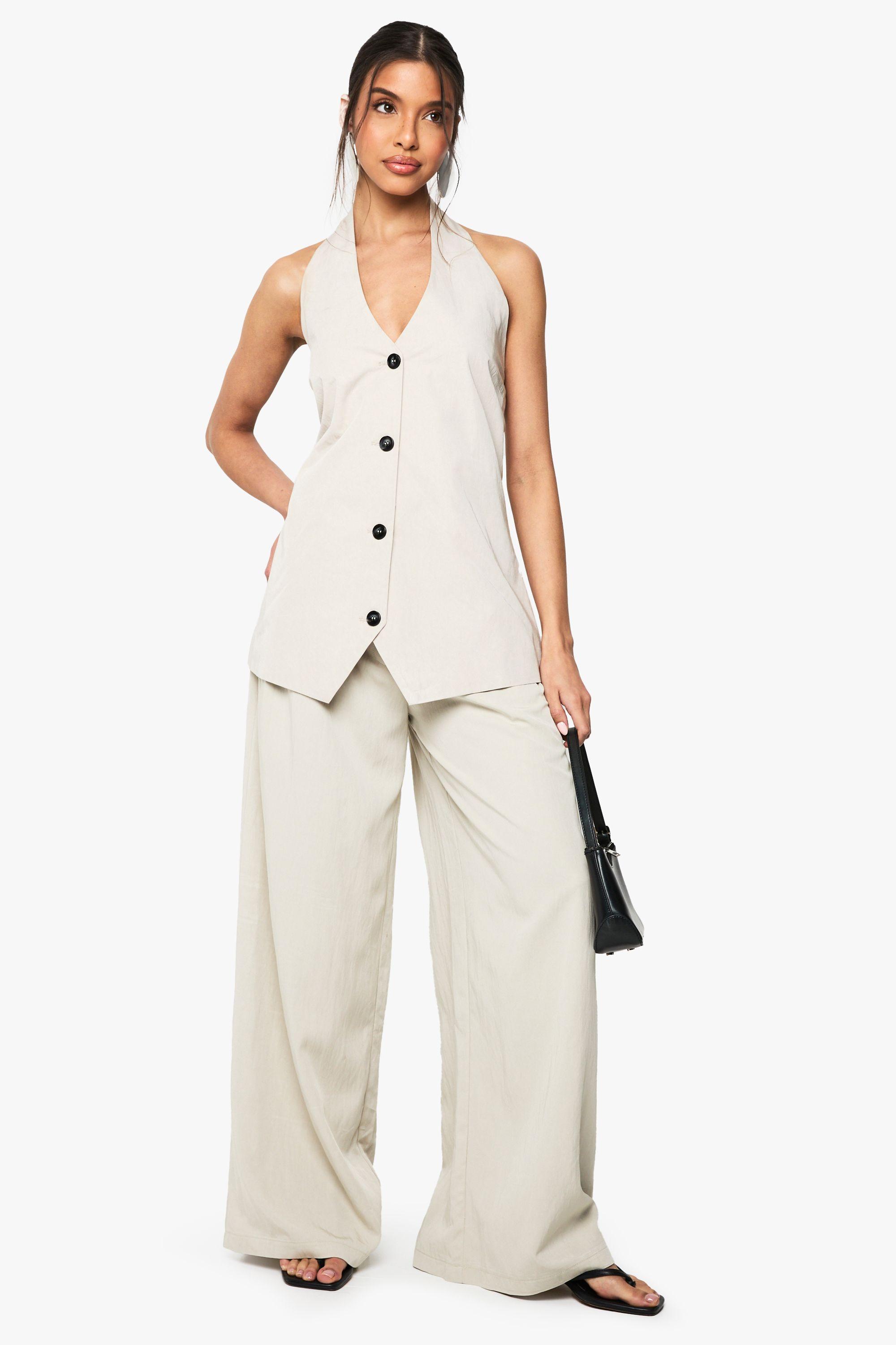 Floaty Pleated Wide Leg Tailored Trouser by BOOHOO Floaty Pleated Wide Leg Tailored Trouser by BOOHOO