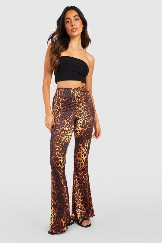 Leopard Printed Slinky Flared Trousers by BOOHOO