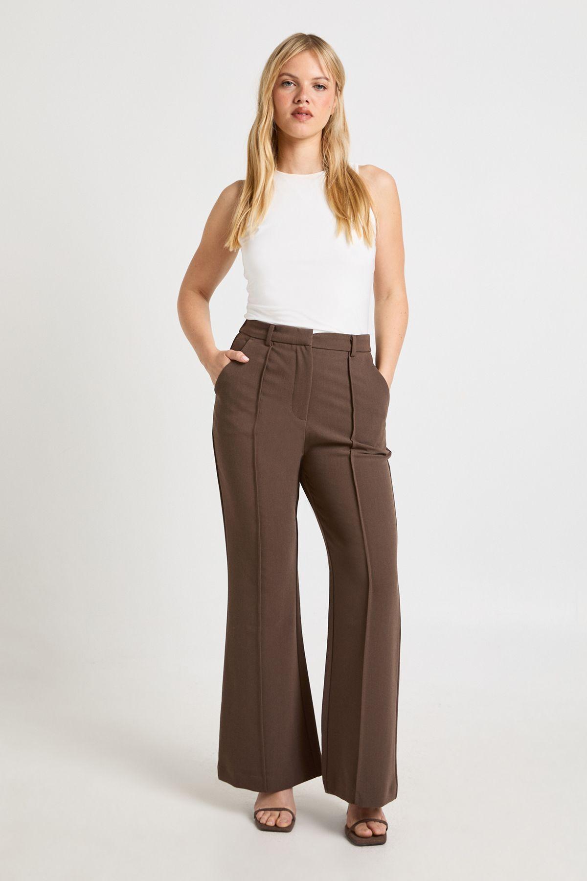 Petite Essential Flare Leg Tailored Trousers by BOOHOO
