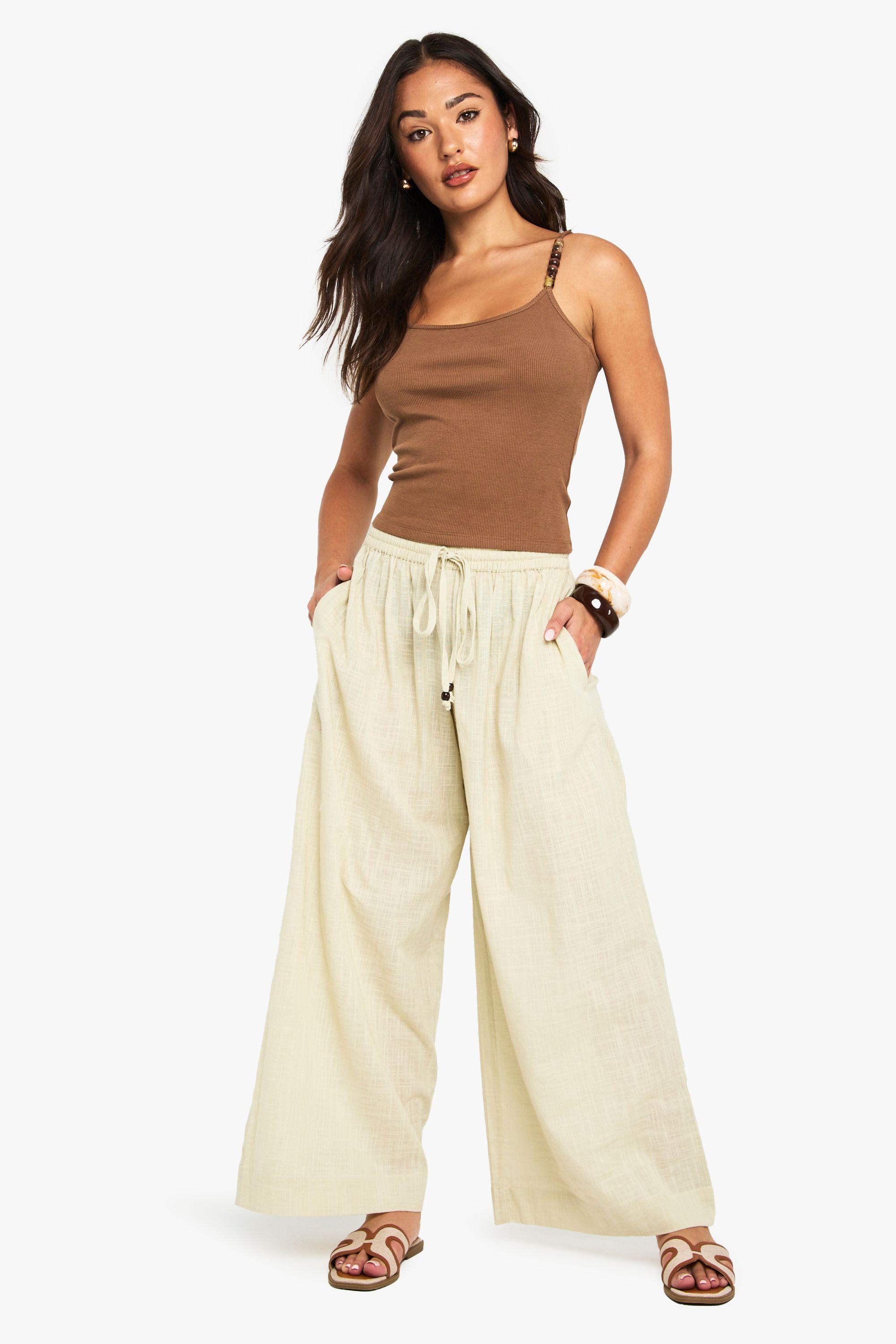 Petite Linen Beaded Wide Leg Beach Trousers by BOOHOO Petite Linen Beaded Wide Leg Beach Trousers by BOOHOO