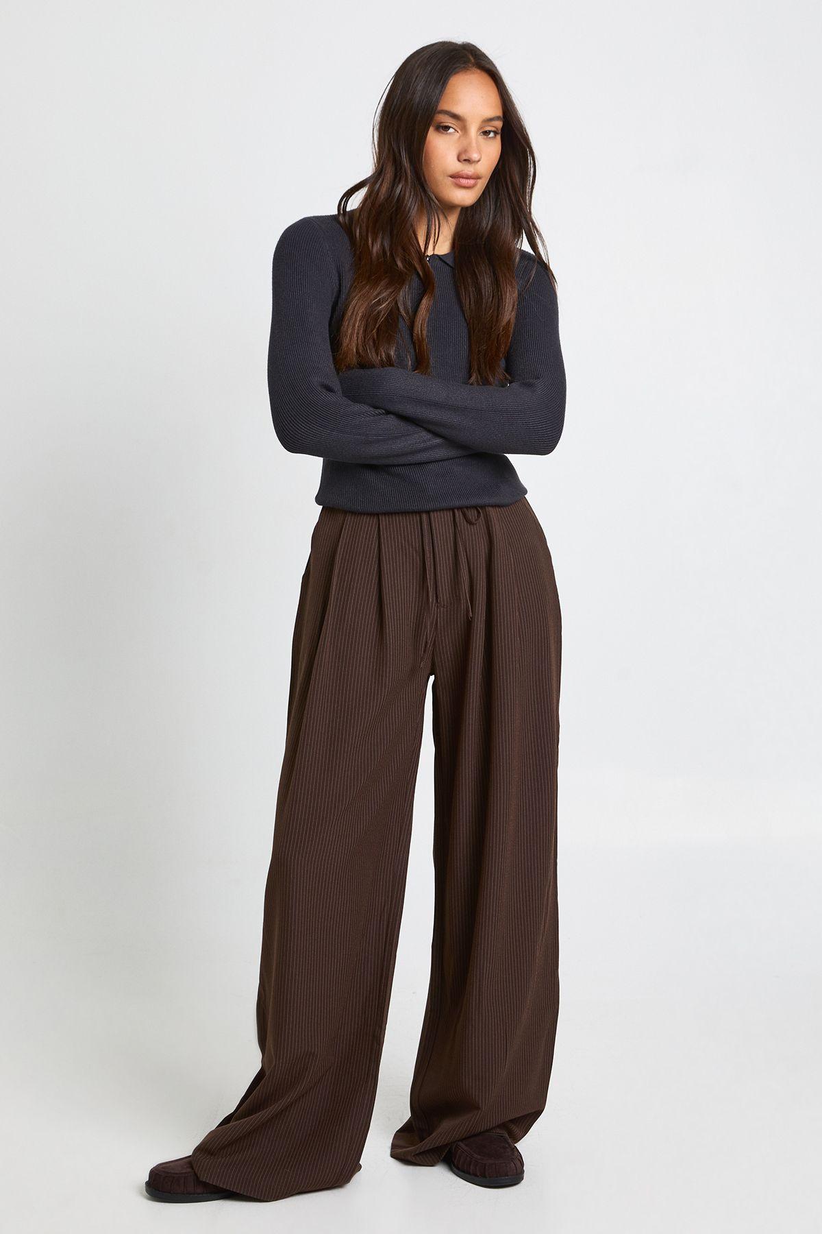 Premium Long Sleeve Collared Rib Knit Top by BOOHOO