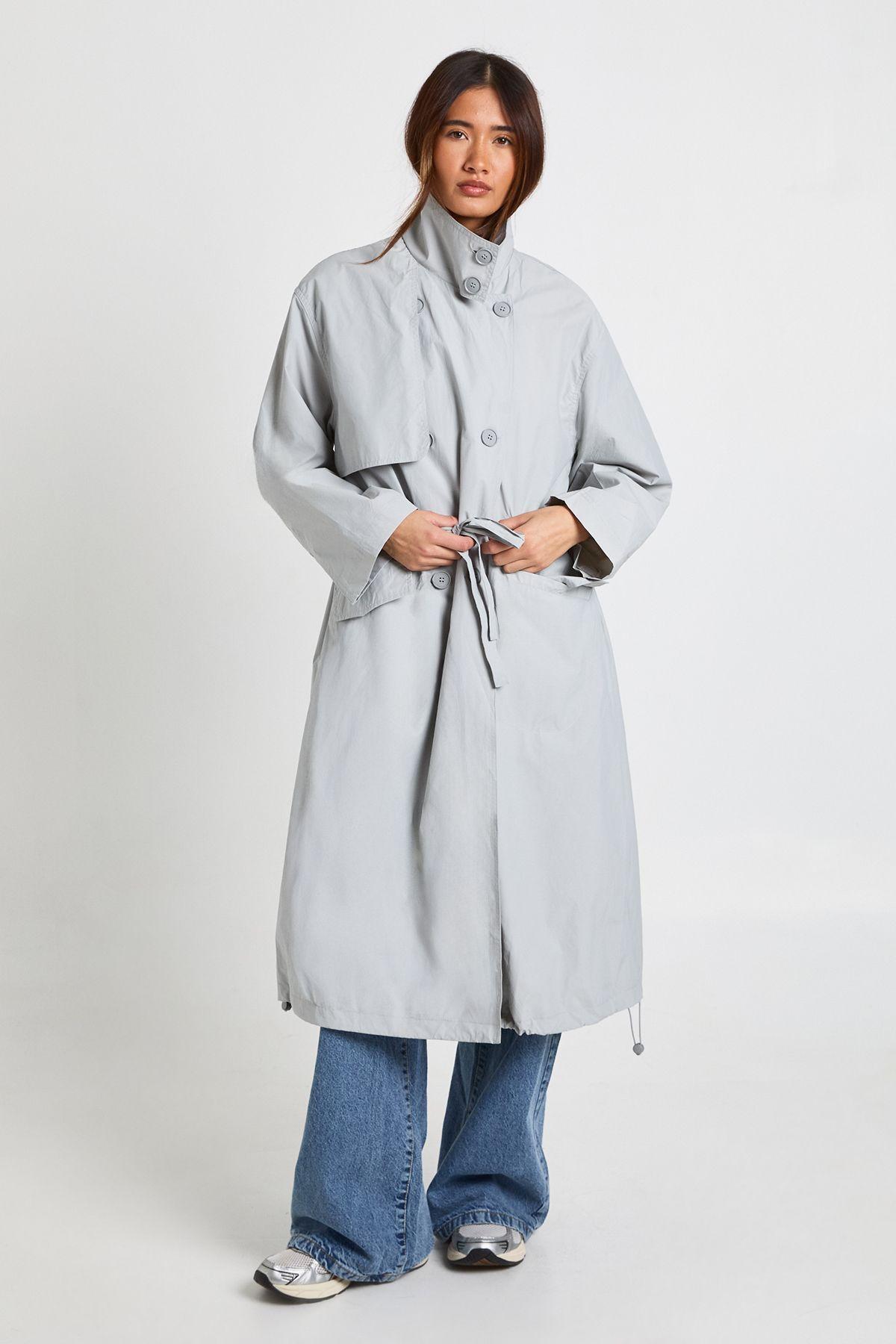 Textured Cinched Waist Funnel Neck Trench Coat by BOOHOO