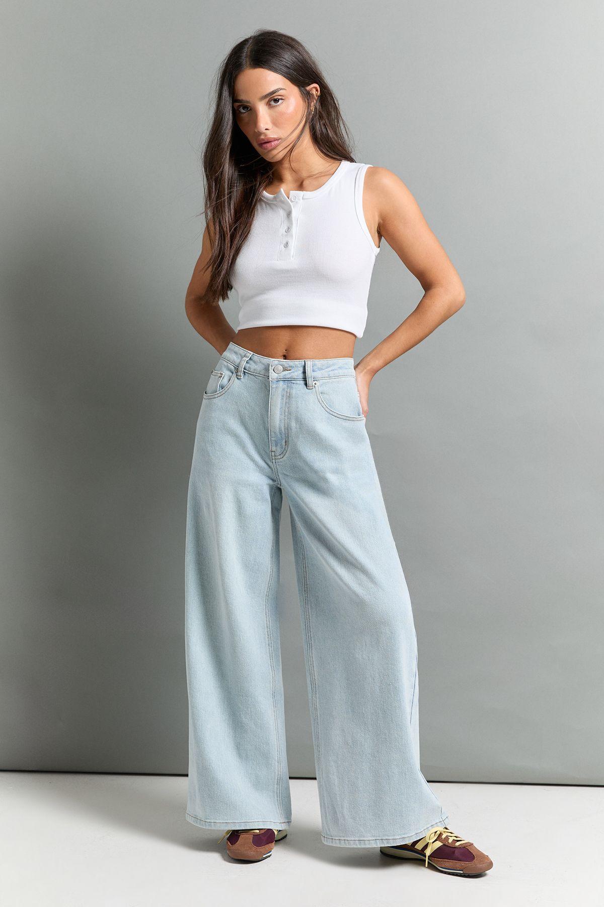 The Petite Mid Waist Wide Leg Jean by BOOHOO