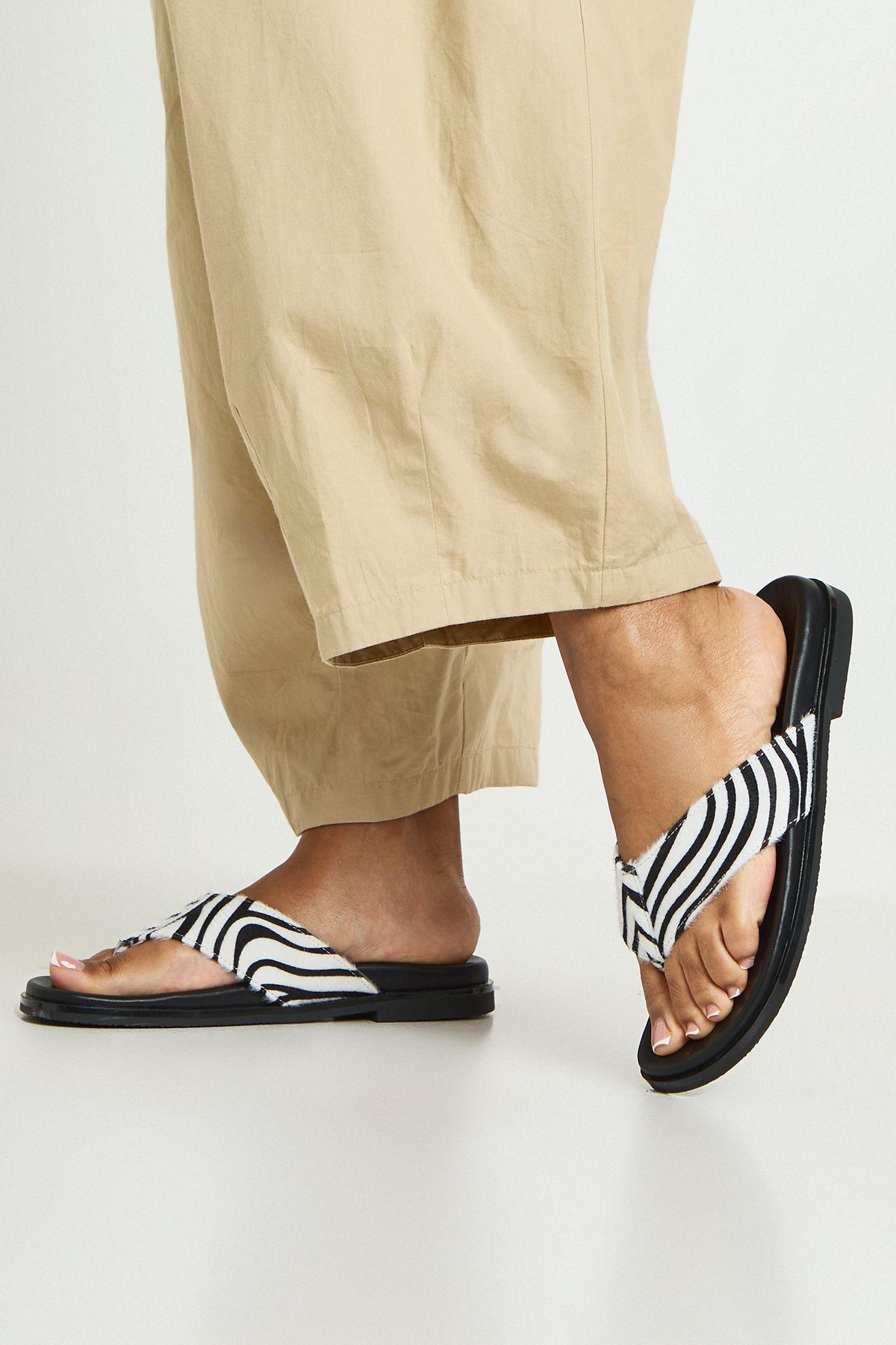 Zebra Print Footbed Flip Flops by BOOHOO