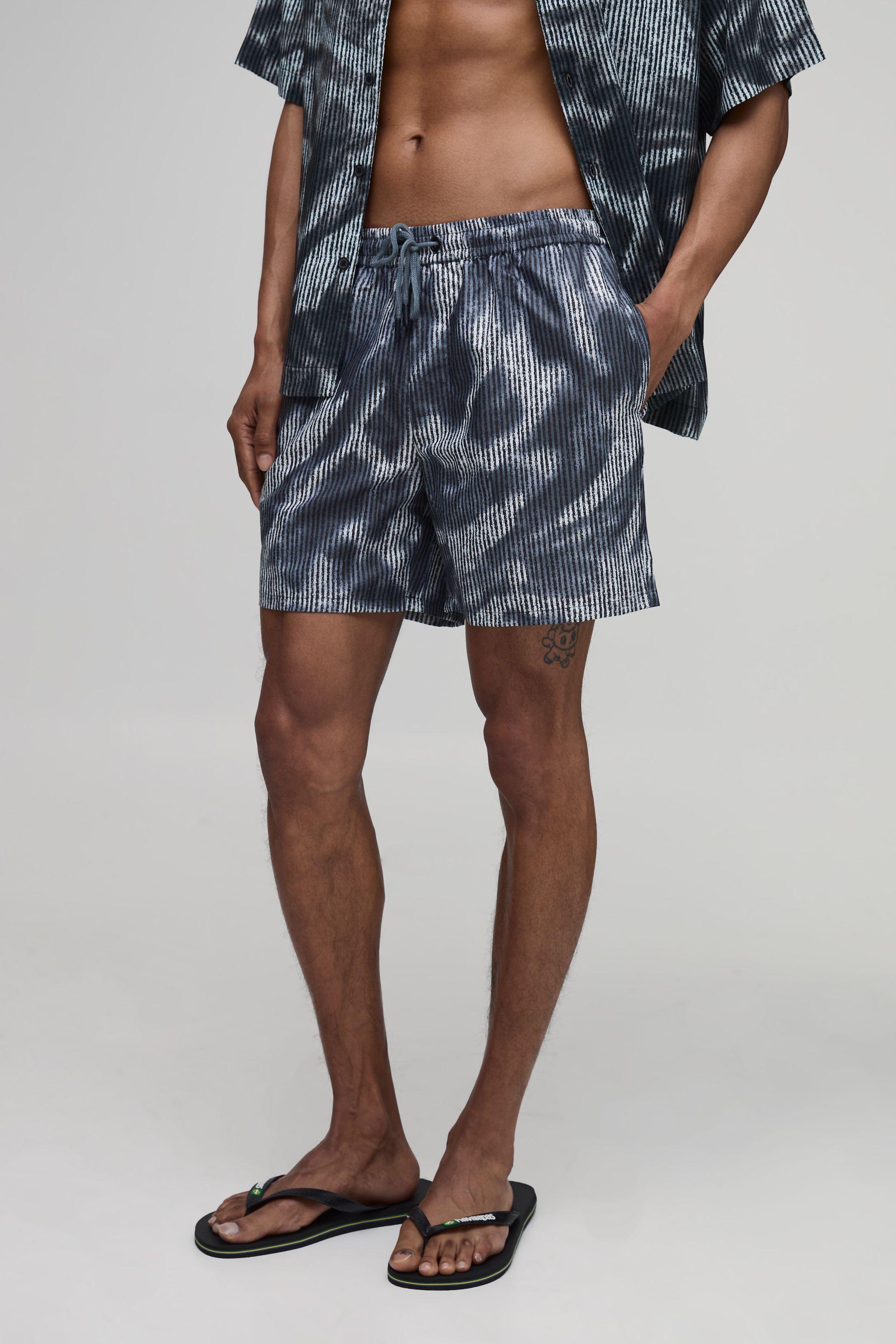 Abstract Print Mid Length Swim Short by BOOHOOMAN