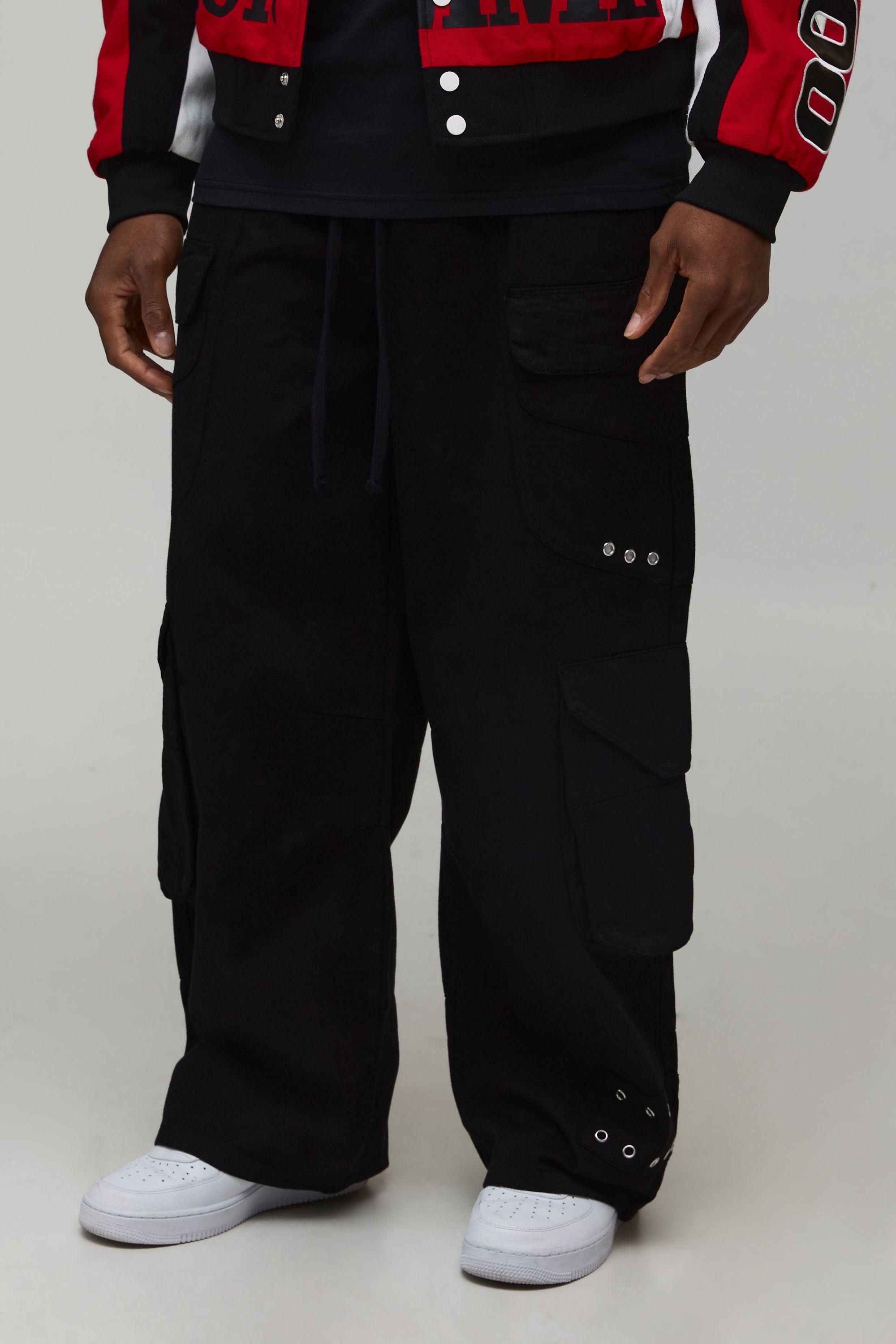 Baggy Flare Fit Multi Pocket  Elasticated Cargo Trouser by BOOHOOMAN