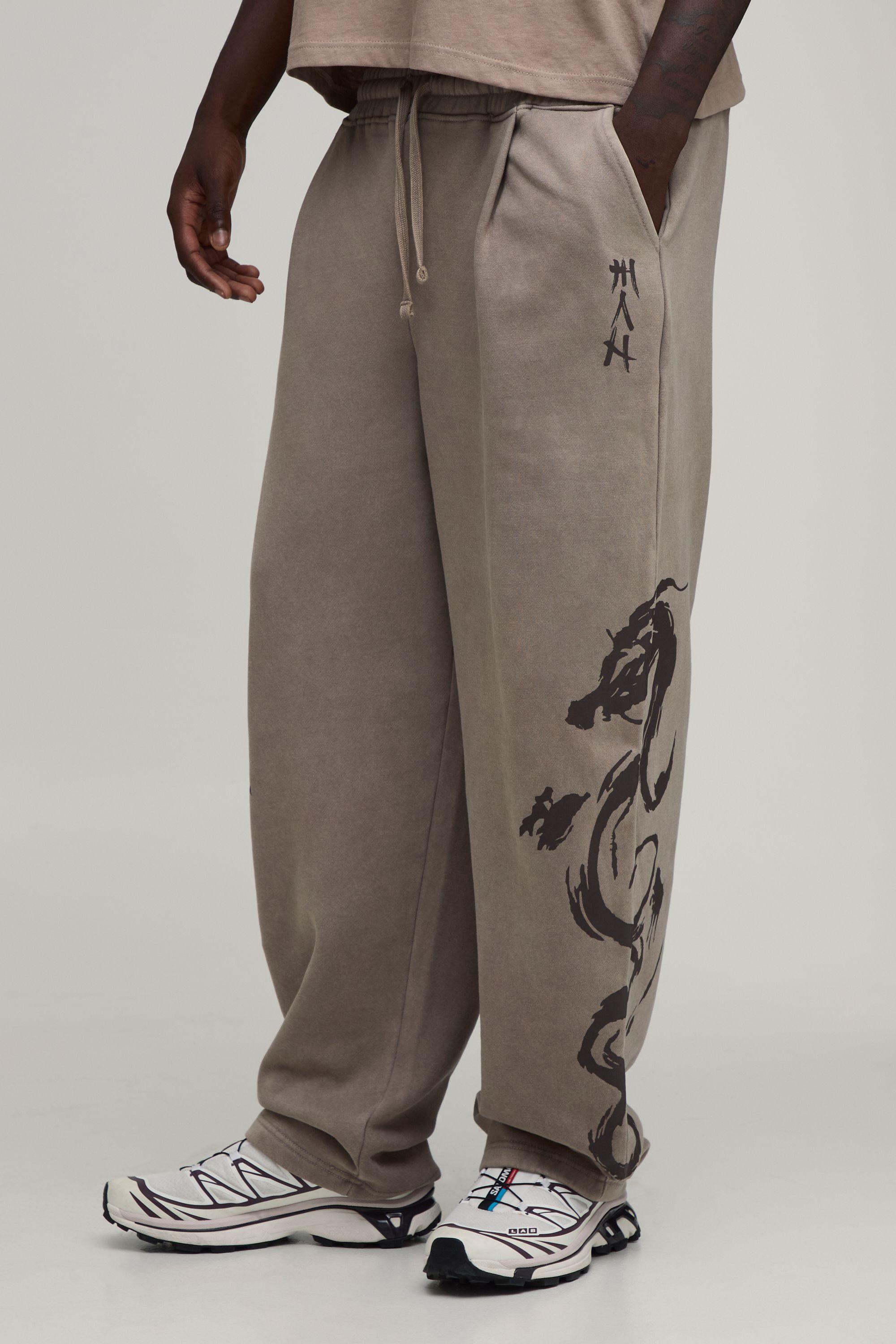 Balloon Fit Dragon Printed Washed Joggers by BOOHOOMAN