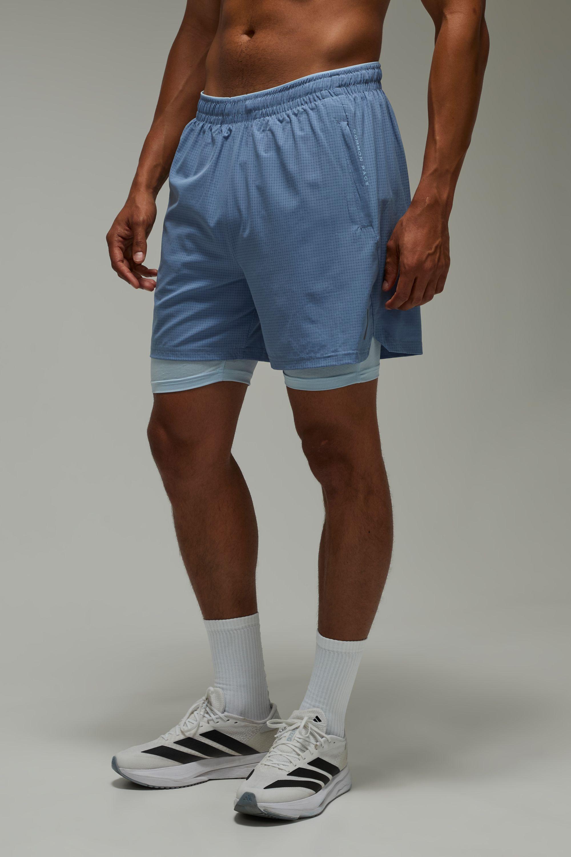 Common Pace Running Perforated 2 in 1 Short by BOOHOOMAN