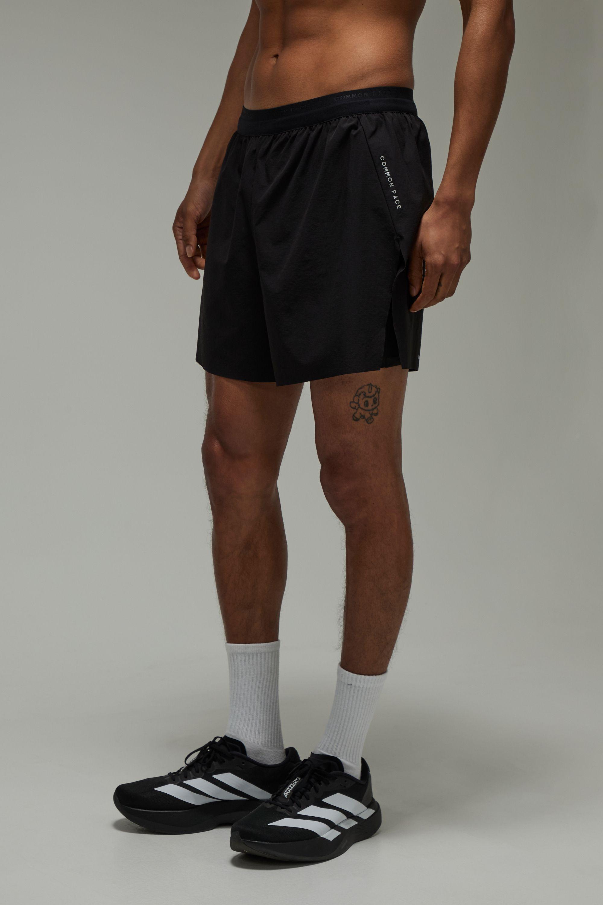 Common Pace Running Race Day 2in1 Split Short by BOOHOOMAN