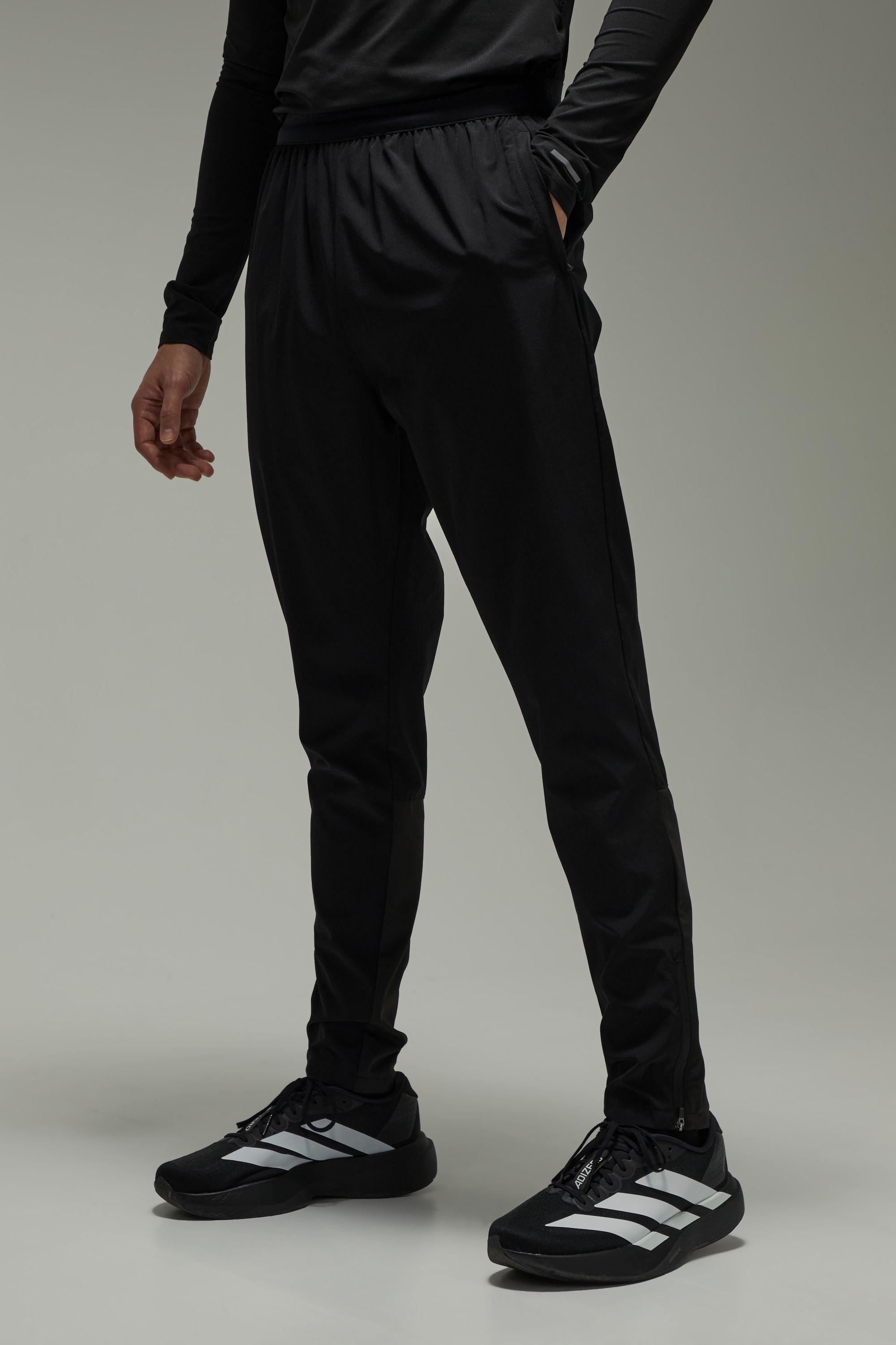 Common Pace Running Ultra Zip Hem Tapered Joggers by BOOHOOMAN