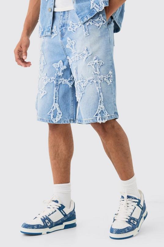 Distressed Cross Applique Denim Jorts In Light Blue by BOOHOOMAN