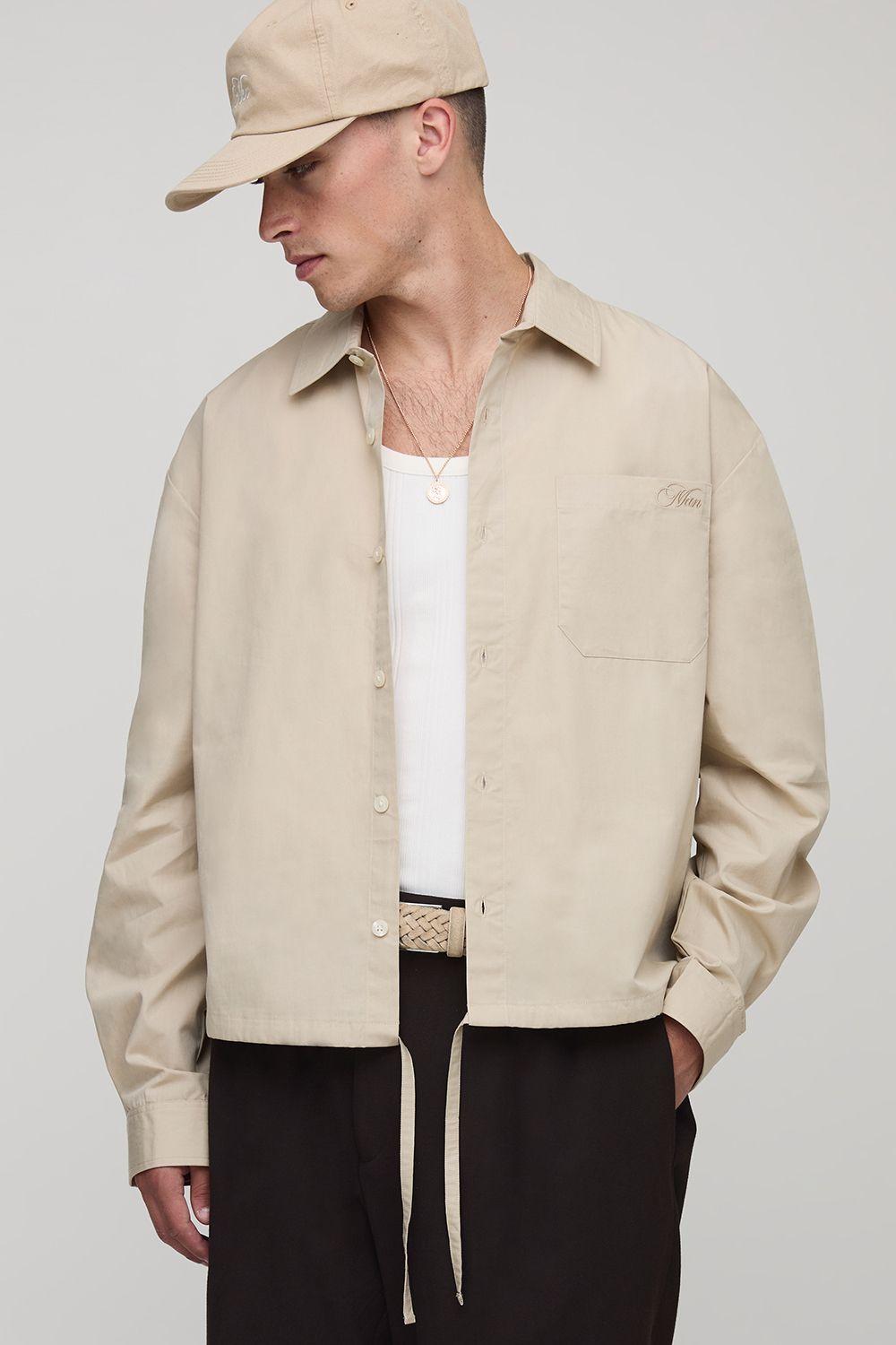 Long Sleeve Embroidered Boxy Oversized Bungee Hem Poplin Shirt by BOOHOOMAN