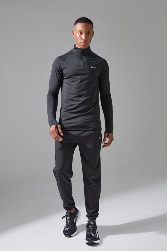 Man Active 1/4 Zip and Jogger Tracksuit by BOOHOOMAN