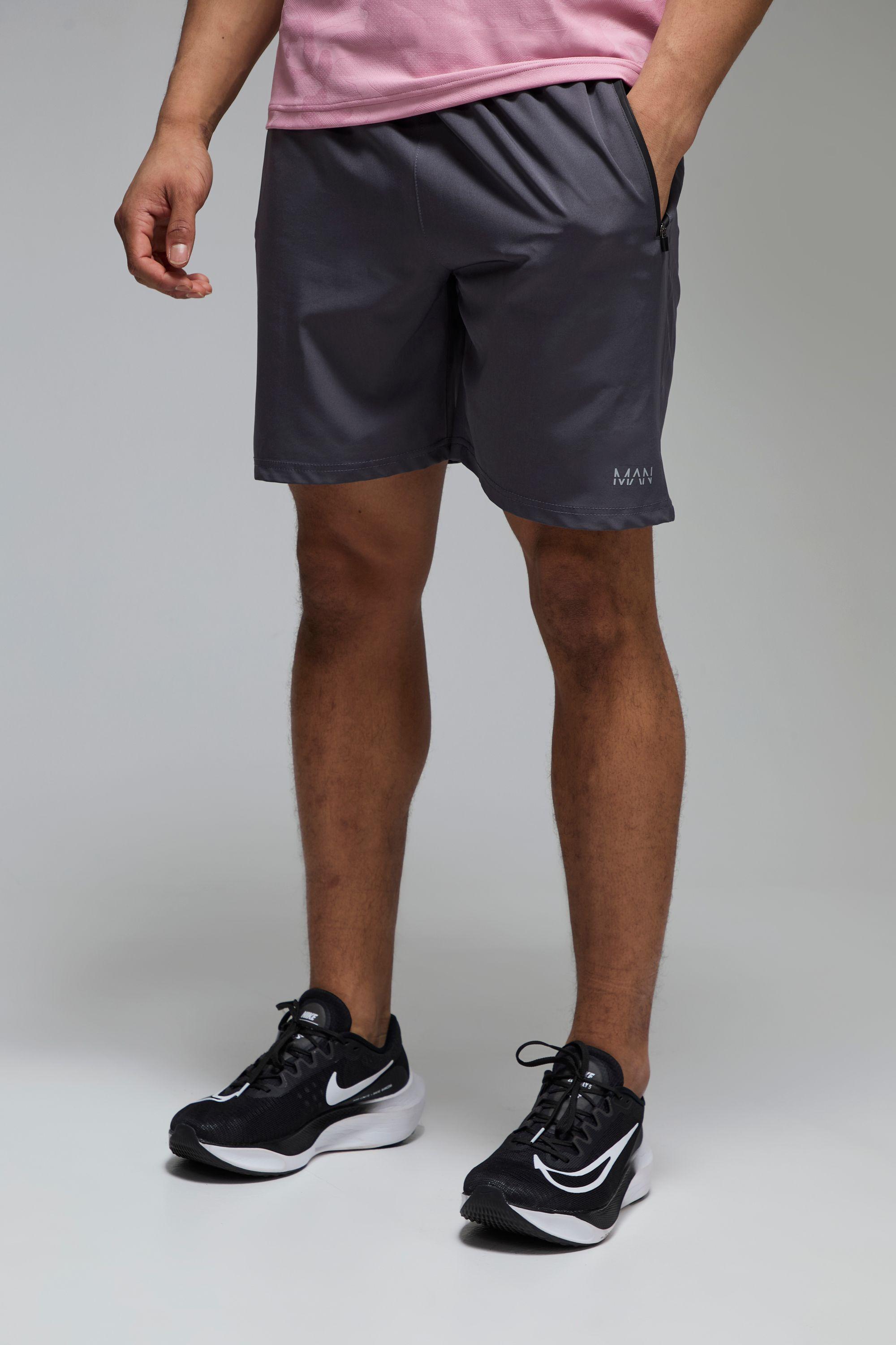 Man Active Regular Fit Stretch Woven 7inch Short by BOOHOOMAN