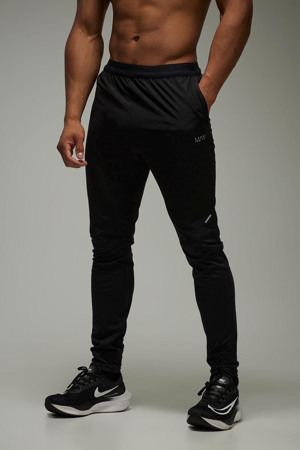 Man Active Running Stretch Tapered Jogger by BOOHOOMAN