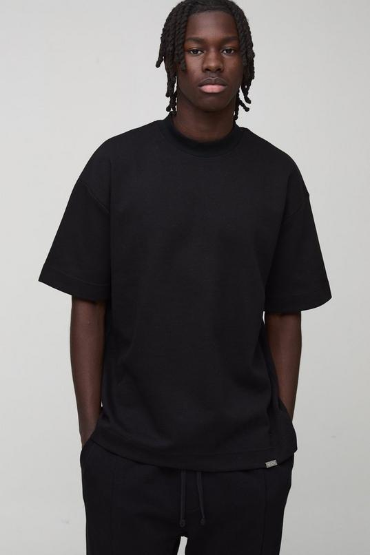 Man Oversized Extended Neck Heavy Interlock T-shirt by BOOHOOMAN